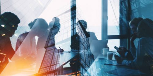Business people collaborate together in office. Double exposure effects Business people collaborate together in office. Double exposure effects